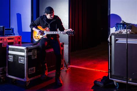 What does backline mean in music, and how does it shape the sound of a live performance?